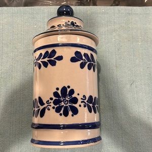 Blue and white Vintage jar made out of clay. Minor chip on side.